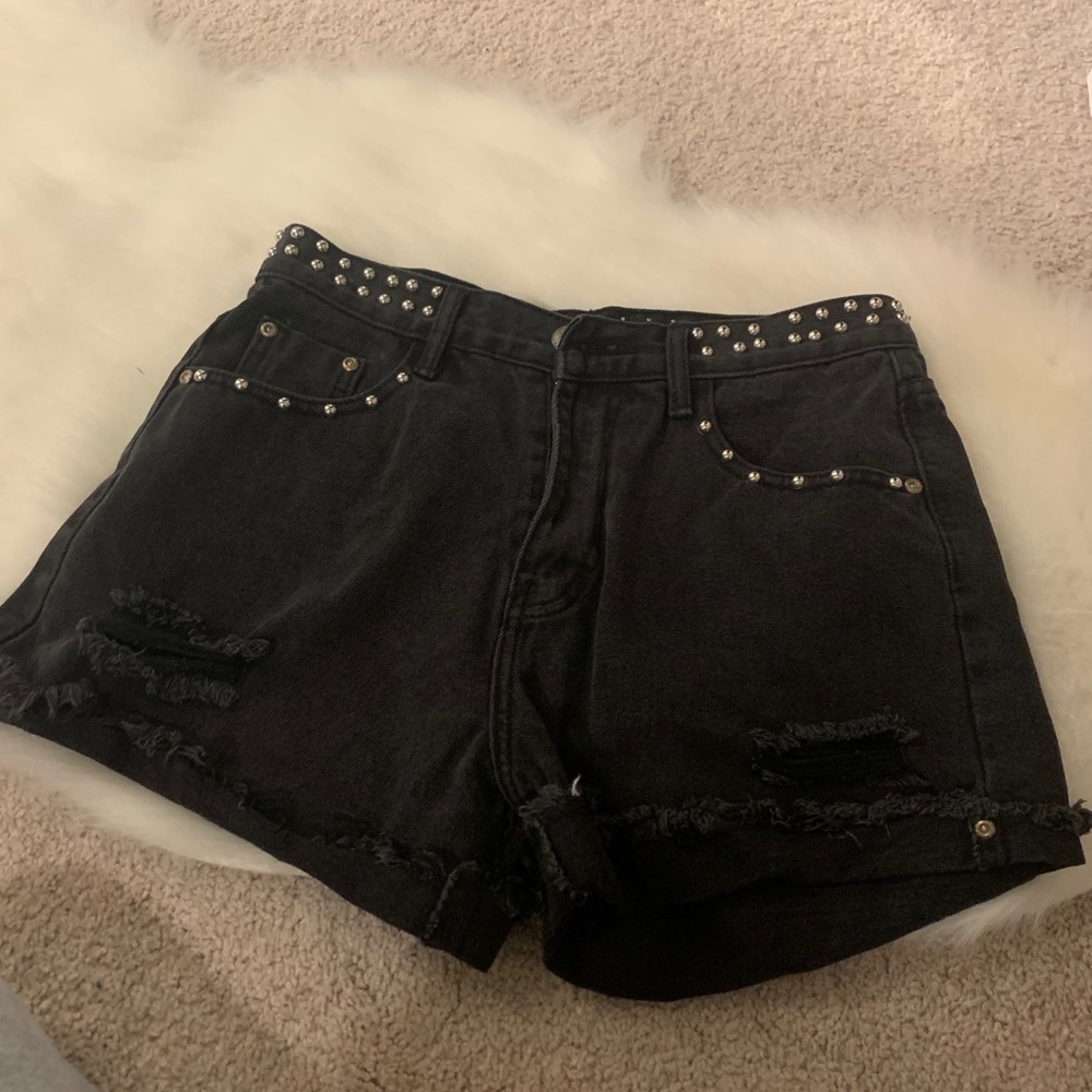 Studded black denim shorts